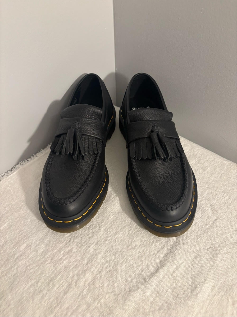Dr. Martens Black Leather Tassel Kiltie Loafers with Yellow Welt Stitching